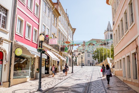 AVEIRO, PORTUGAL - September 26, 2017: View on the crowded street with cafe and bars in the old town of Aveiro, Portugalのeditorial素材