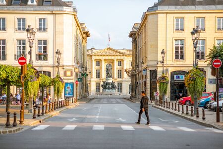 REIMS, FRANCE - August 27, 2017: Street view with man crossing street in Reims city, Franceのeditorial素材