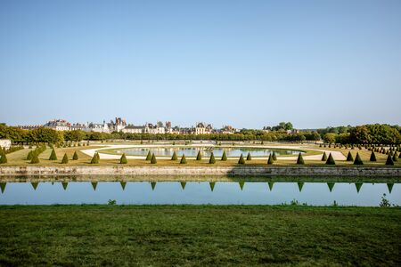 FONTAINBLEAU, FRANCE - August 28, 2017: Morning view on the famous gardens of Fontainebleau palace located on the southeast of Paris in Franceのeditorial素材