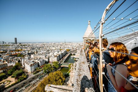 PARIS, FRANCE - September 01, 2018: Viewpoint terrace on the top of Notre-Dame cathedral with tourists in Parisのeditorial素材