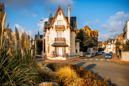 Street view of Deauvile village with beautiful buildings during the morning light in Franceの写真素材