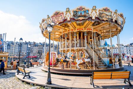 HONFLEUR, FRANCE - September 06, 2017: Circus carousel near the harbour of Honfleur, famous french town in Normandyのeditorial素材