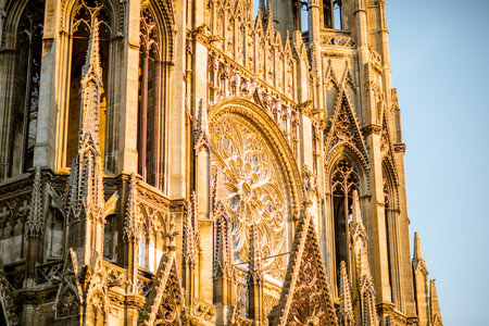 View on the gothic facade of the church of Saint-Ouen during the sunset in Rouen city, the capital...