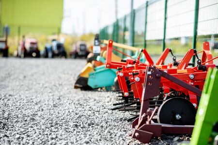 New plows for farming on the open ground of agricultural shopの写真素材
