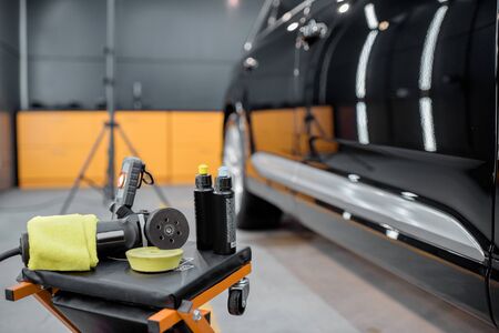 Professional equipment for automotive body polishing at the car service. Car detailing tools for vehicle careの写真素材