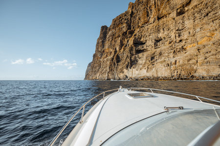 Beautiful seascape on the rocky coastline on Tenerife island near Los Gigantes, view from the yacht