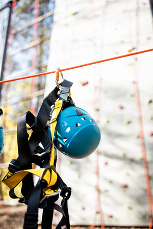 Climbing equipment hanging on the rope at amusement park outdoors