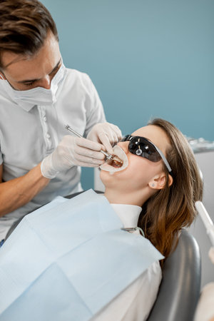 Patient with dental braces during a regular orthodontic visit