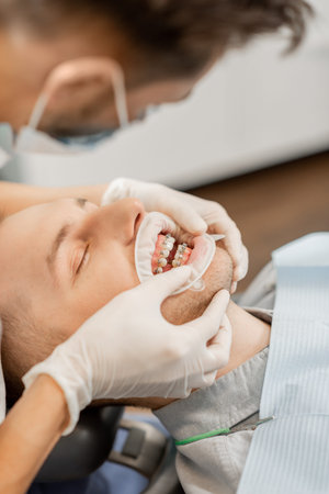 Patient with dental braces during a regular orthodontic visit