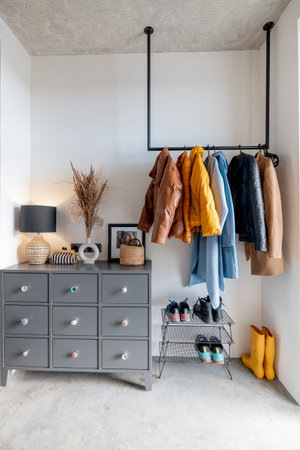 House hallway interior with clothes and furnitureの写真素材