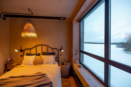 Stylish bedroom interior in natural boho styleの写真素材