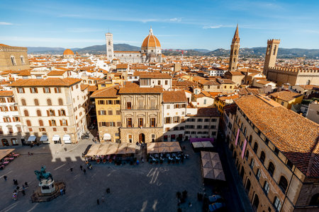 Aerial view on the old town of Florence with famous Duomo cathedral on skyline on sunny day. Outstanding cityscape of tuscany. View from Vecchio palaceの写真素材