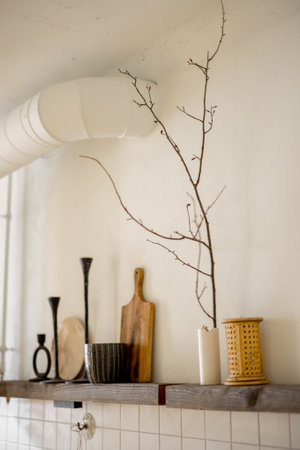 Wooden shelves with decoration in kitchen . Concept of decoration and open space above the kitchen table topの写真素材