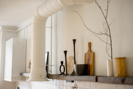 Wooden shelves with decoration in kitchen . Concept of decoration and open space above the kitchen...