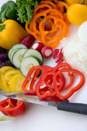 Salad Fixings on chopping board verticalの写真素材