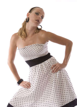 Young blond in a polka dot dressの写真素材