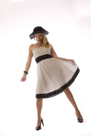 Young blond in a polka dot dressの写真素材