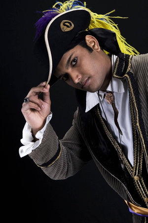 Adult Male Indian Model dressed as a pirate over black backgroundの写真素材
