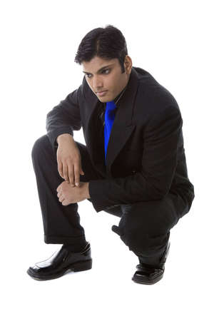 Adult Male Indian Model in business suit over white backgroundの写真素材