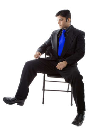 Adult Male Indian Model in business suit over white backgroundの写真素材