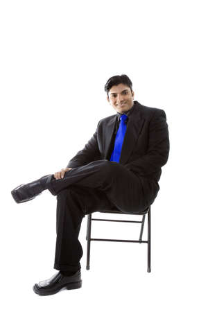 Adult Male Indian Model in business suit over white backgroundの写真素材