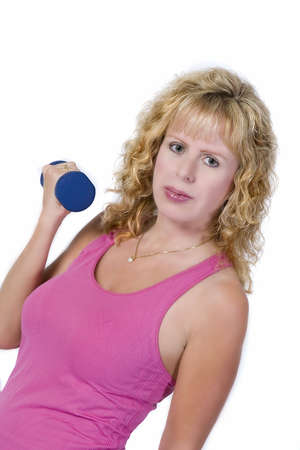 Blond woman exercising with hand weightsの写真素材