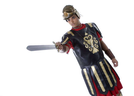 Adult Male Indian Model dressed as Roman Soldier over white backgroundの写真素材