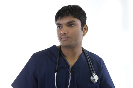 Male in Scrubs over a white backgroundの写真素材