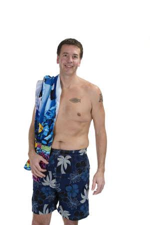 Adult male in swimming suit and beach towelの写真素材