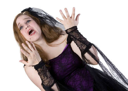 Brunette Model in Goth clothing over white backgroundの写真素材
