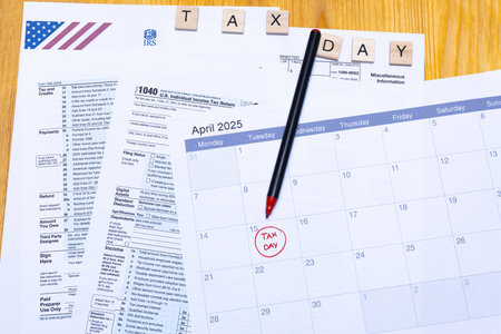 Conceptual image depicting Tax Day in the United States, with IRS forms, a calendar pointing to...