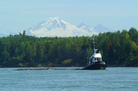 TUG IN THE RIVERの写真素材