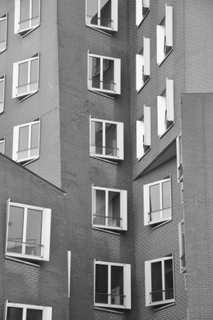 Interlocking clinker facade of the Gehry buildings at the Media Harbor in Dusseldorf, Germanyのeditorial素材