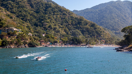 Boca de Tomatlan , Mexico- December 12/2016. Water taxi's leave Boca de Tomatlan bringing residents, tourists and supplies to and from beach communities along the south coast of the Bay of Banderos.のeditorial素材