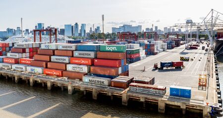 Buenos Aries /Argentina - January 19, 2020. Cargo containers moved by cranes are stacked around Puerto Madero awaiting shipping to other countries .のeditorial素材