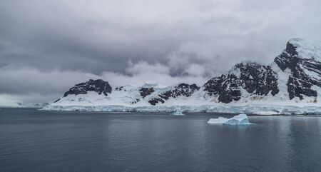 Antarctic landscape with mountains and glaciersの写真素材