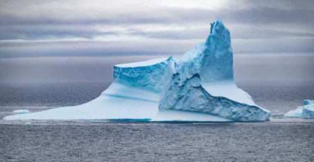 Icebergs floating in the Antarctic after calving off the numerous glaciers in the area.