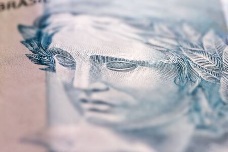 cash, Brazilian money, called REAL, drawn from the bank. Savings and savings coin.の写真素材