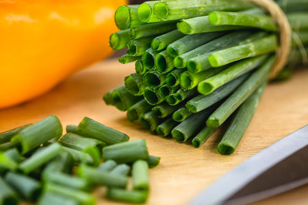 chopped vegetable as a seasoning or culinary ingredient. Allium schoenoprasum, popularly known as...