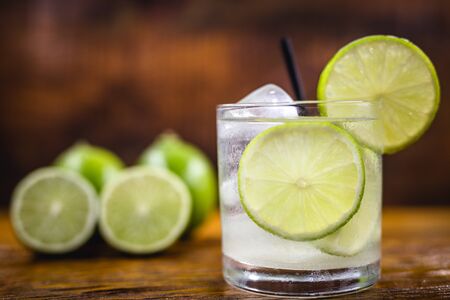 Lemon Fruit Lime Caipirinha of Brazil on grey vintage, Brazilian traditional drink, isolated with space for text.の写真素材