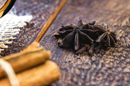 hot Brazilian wine, called quentÃ£o, and its ingredients, cinnamon sticks, star anise or cloves,...