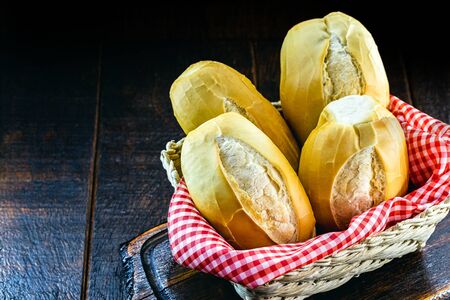 Basket of "French bread", traditional Brazilian bread. National day of Brazilian French bread.の写真素材