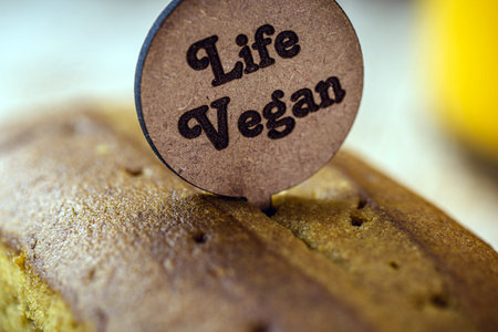 vegan banana bread with the English phrase: Vegan life. Healthy, gluten-free food without animal...