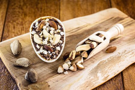 exotic vegan easter egg with chocolate and brazil nuts, without sugar. Vegan Easter 2020.の写真素材