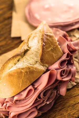 Bread sandwich with bologna. Typical Brazilian sandwich found in the municipal market of the city of SÃ£o Paulo.の写真素材