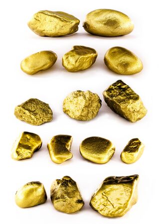 Collection of gold nuggets on isolated white background. High resolution photo of gold stones. Concept of luxury and wealth.の写真素材