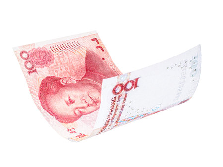 Yuan banknote on white background, Chinese money. Renminbi or remmimbi, is the official currency of...
