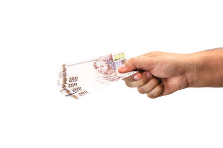hand holding two hundred reais bank notes, brazil money, payment concept, grand prize or profitの写真素材