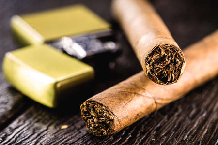 cigars with old zippo lighter, vintage imageの写真素材