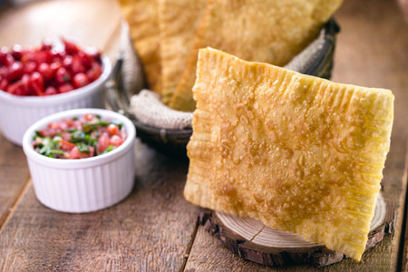 Brazilian pastry, fried, salty typical of Brazil, with copyspace